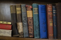 row of books on a bookshelf 