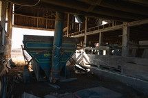 Grain machine in wooden barn