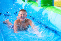child on a waterslide 