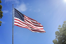 American flag against a blue sky 