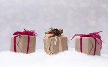 gifts wrapped in brown paper 