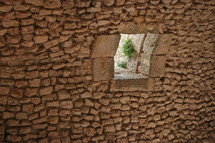 window opening in ruins at an historic site in Jordan 