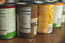 Canned food on a wood table
