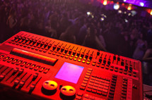 soundboard and crowds at a concert 