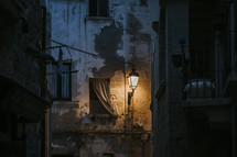 street lamp in an alley 