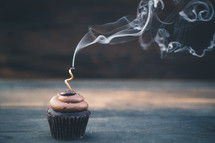 blown out candle on a cupcake 