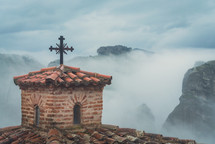 tile roof church and steeple of a greek monastery in Meteora, Greece 