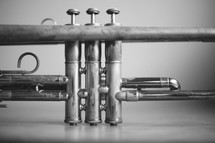 a close up of trumpet valves
