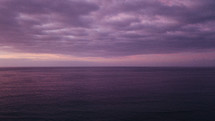 purple clouds over the ocean 