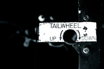 tailwheel up and down sign