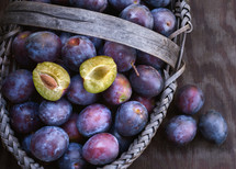 plums in a basket 