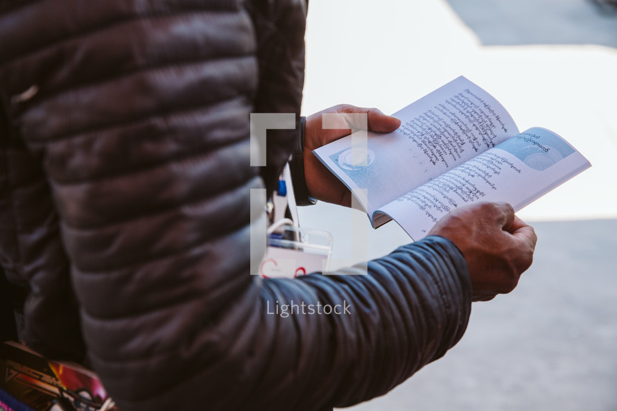 man holding a Bible in Myanmar