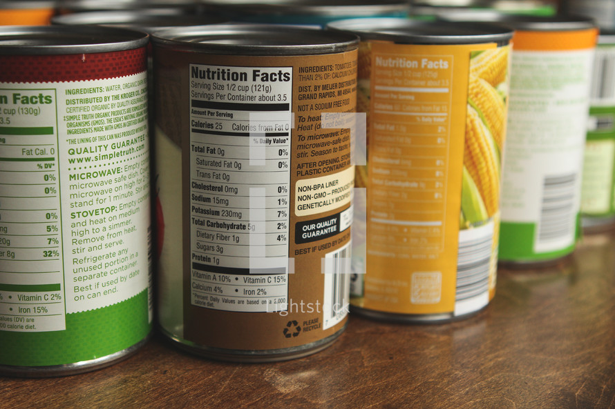 Canned food on a wood table