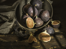 figs in a bowl on a table 