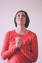 woman looking up to God in prayer 