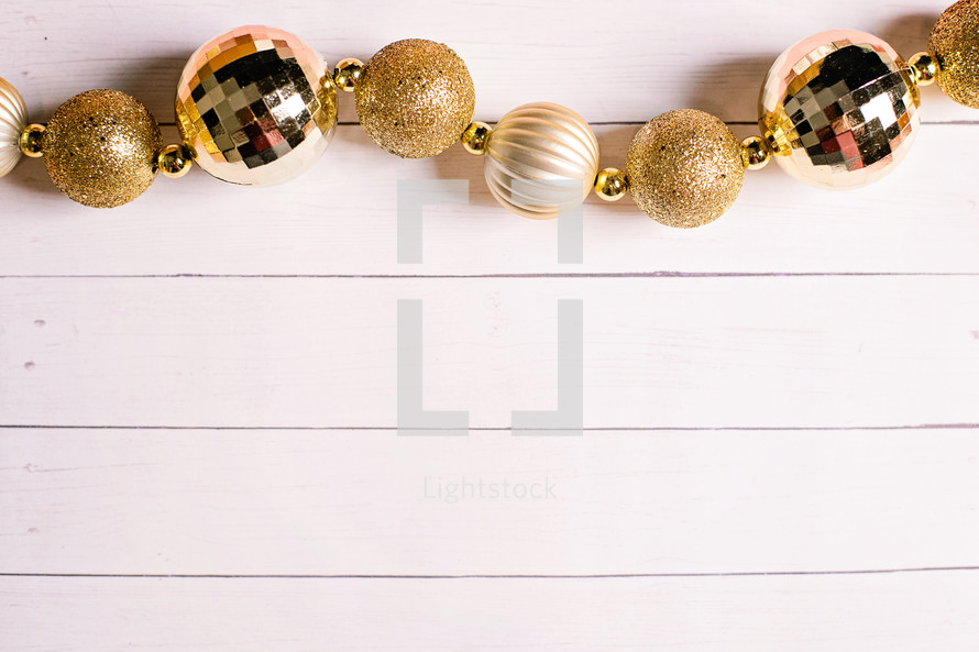 Gold ornament frame on white boards
