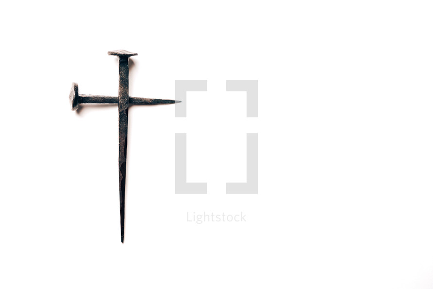 Cross made from nails on a white background - Good Friday