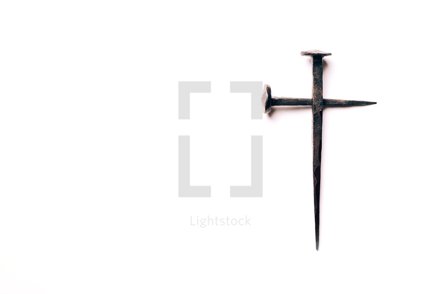 Cross made from nails on a white background - Good Friday