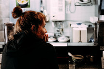 woman sitting in a cafe 
