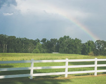 rainbow over farmland 