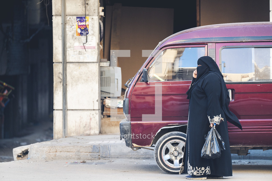 woman walking on the streets of Egypt 