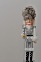 nutcracker against a white background with copy space 