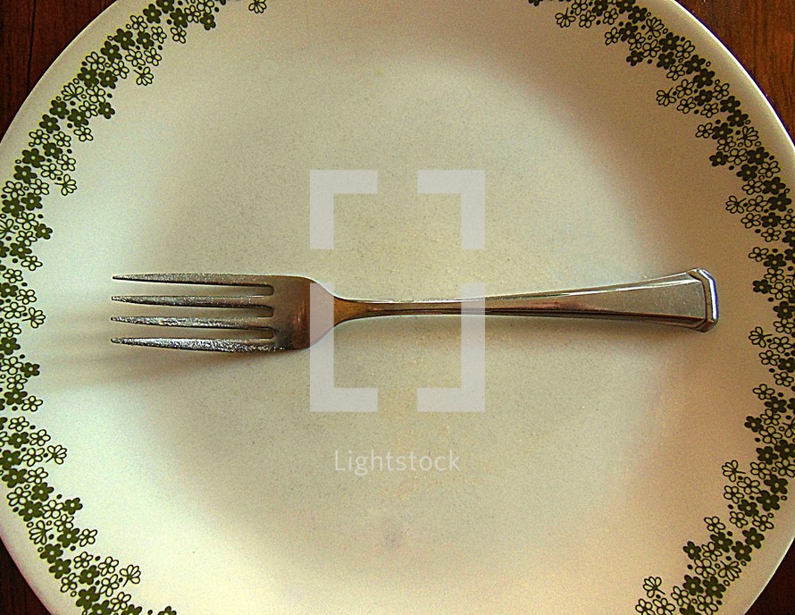 Fork on a plate.