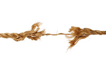 A frayed rope that is near breaking.