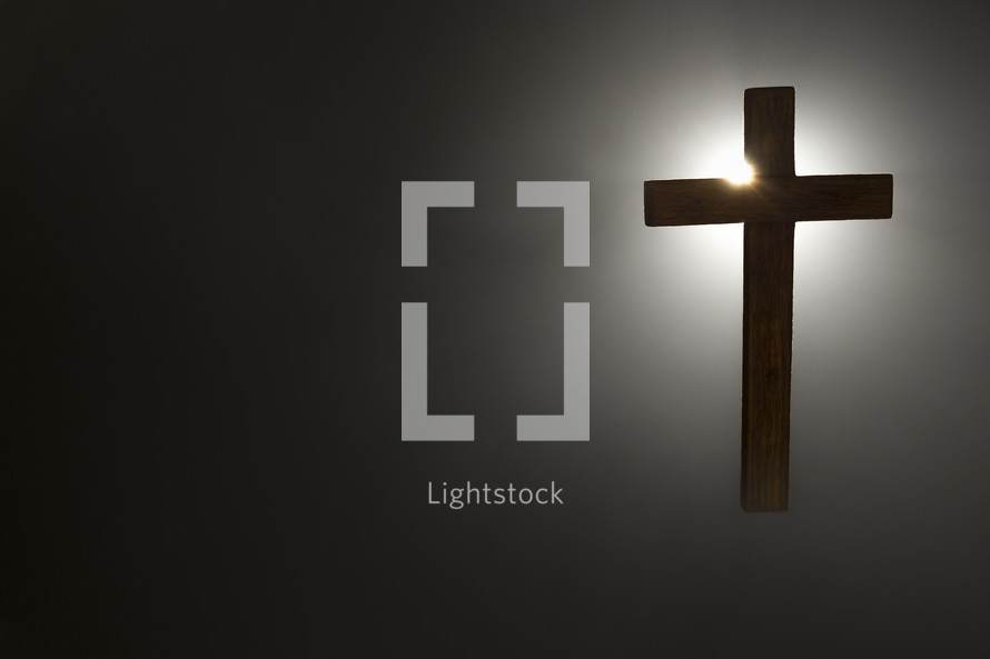 cross with light on black 