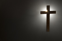 cross with light on black 