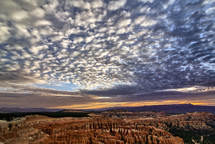 clouds in the sky over Bryce Canyon at sunrise 