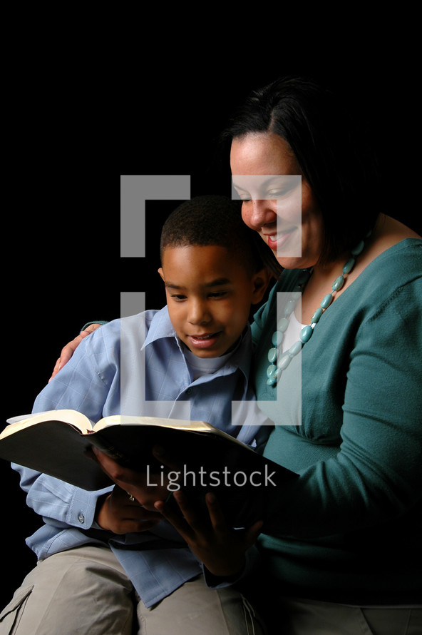 mother reading to her son 