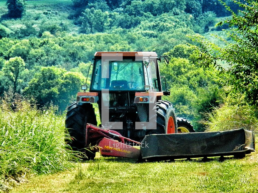 Tractor plowing a field.