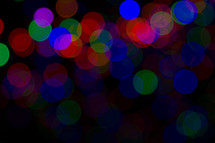 colorful bokeh Christmas lights at night 