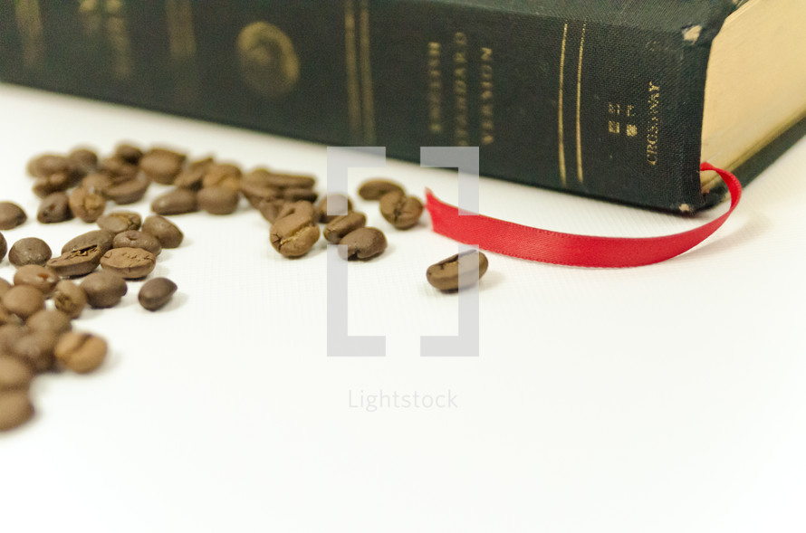coffee beans and a Bible 