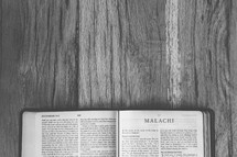 sideways Bible opened to Malachi