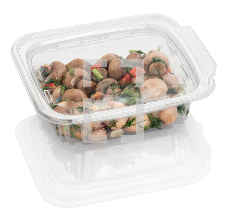 marinated mushrooms in a container 