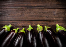 Fresh homemade eggplant on the table. On a wooden background. High quality photo