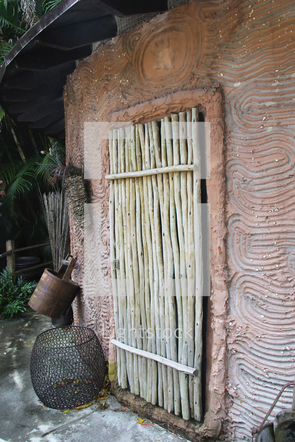 bamboo door on a mud hut 
