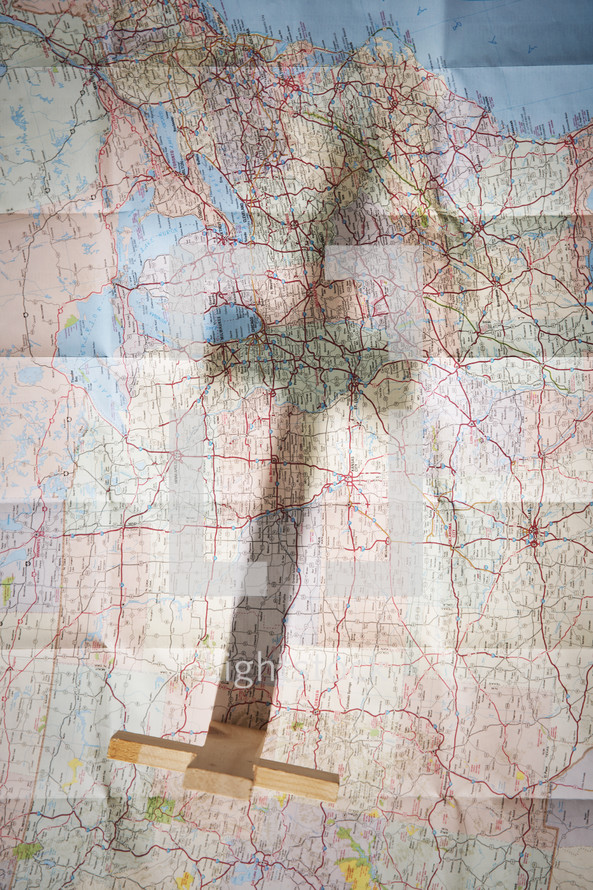 cross shadow on a country map.