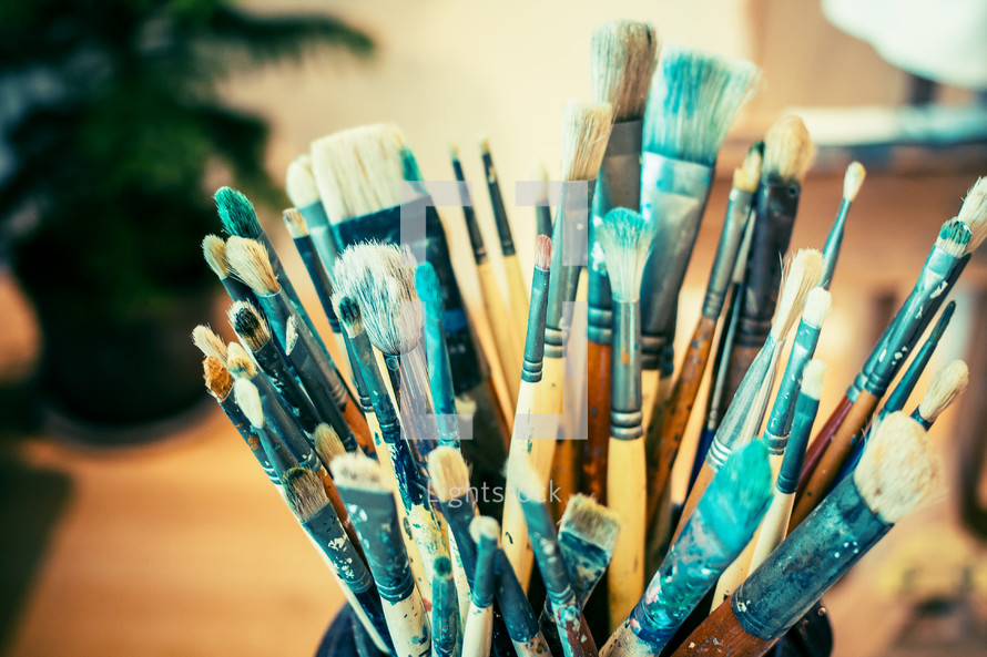 Collection of used paintbrushes.