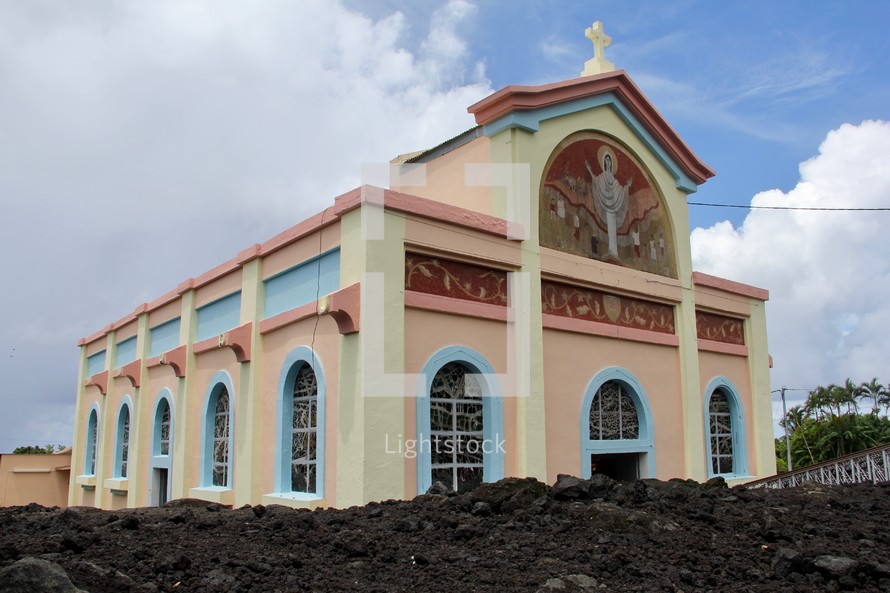 Notre Dame Des Laves Church, surrounded by volcanic lava.