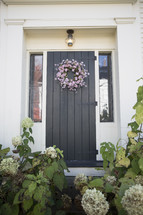 floral wreath on a front door 