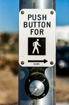Crosswalk sign button push to cross street city pole