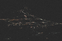 aerial view of lights from a city below 