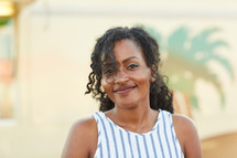 head shot of a smiling African American woman in summer 