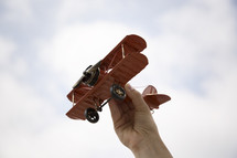flying a toy airplane 