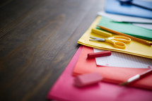 colorful school supplies on a desk 