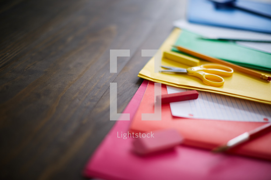 colorful school supplies on a desk 