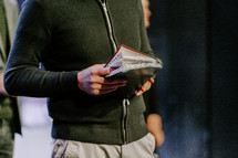 Pastor with a Bible in his hand during a sermon. 